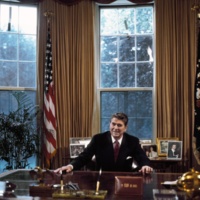 President Ronald Reagan at his desk in the Oval Office, Washington, D.C.